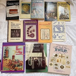 Assorted costume jewelry books